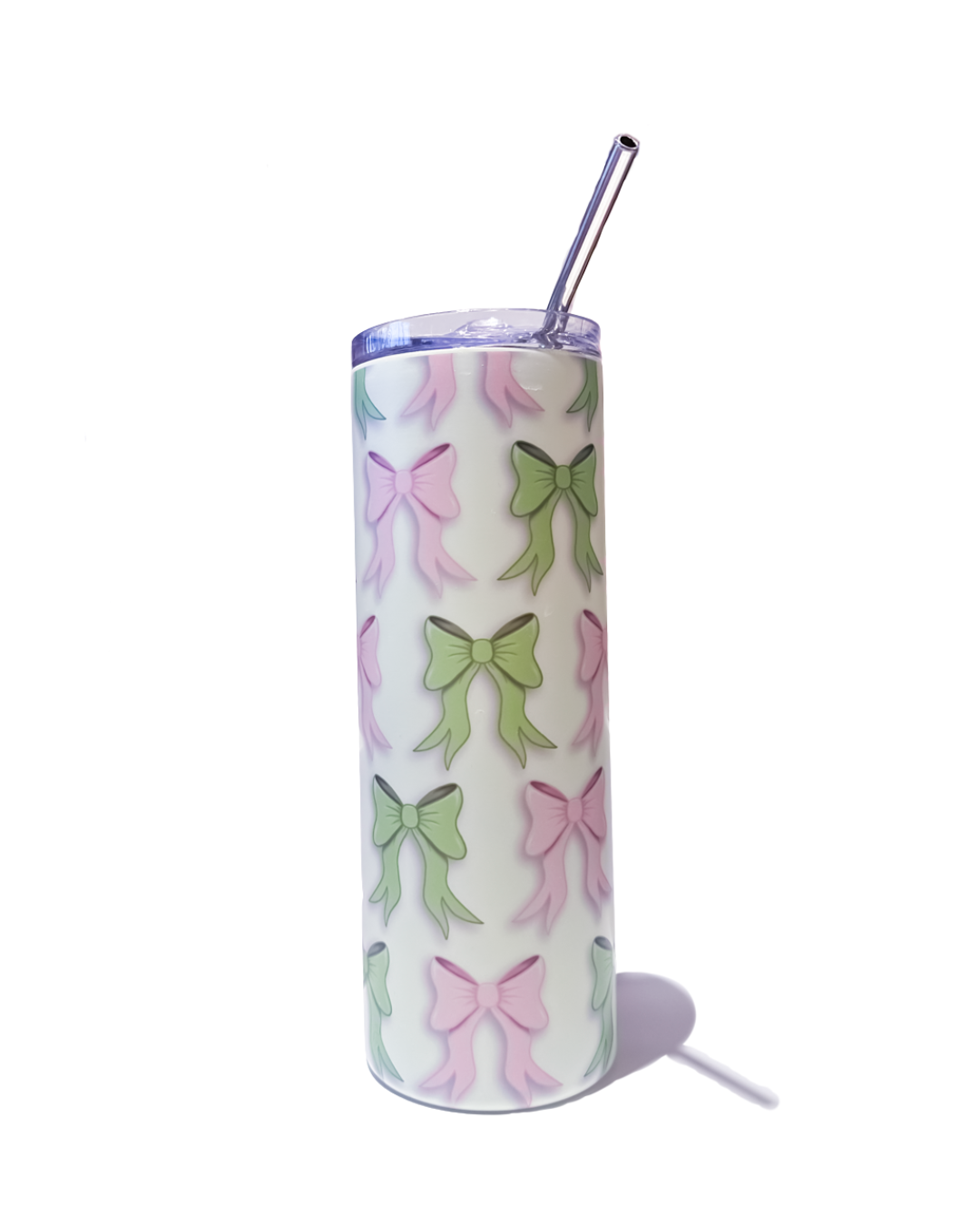 Pink and green bow on green tumbler design shown with lid and straw