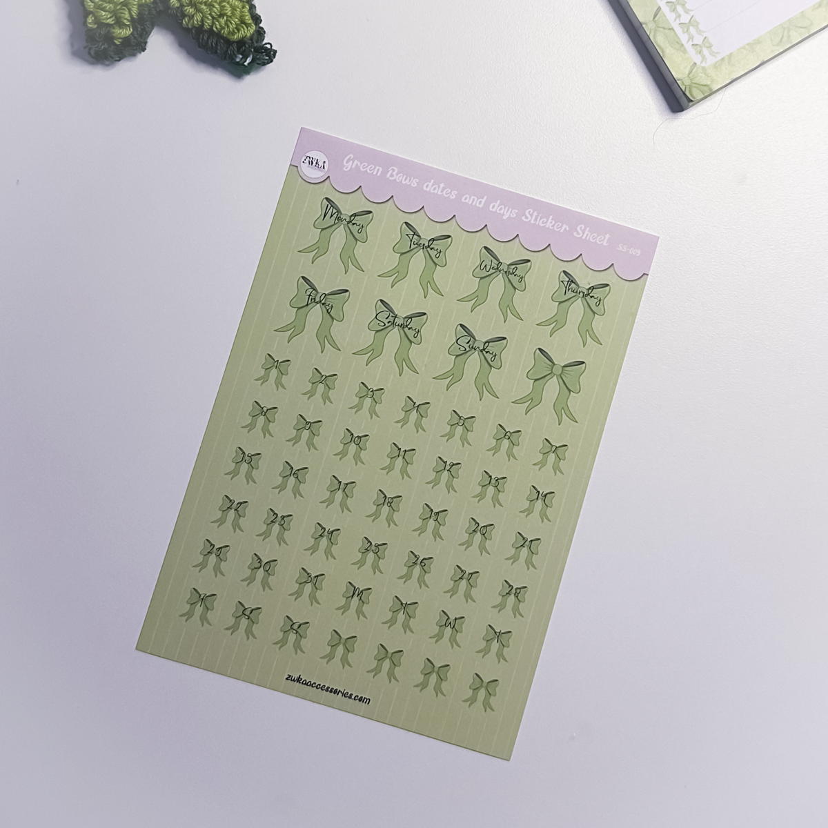 Green Bows planner sticker sheet with elegant green days and dates stickers and bow accents