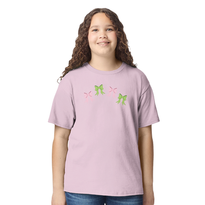 Kids pink t-shirt with pink and green bows design on front