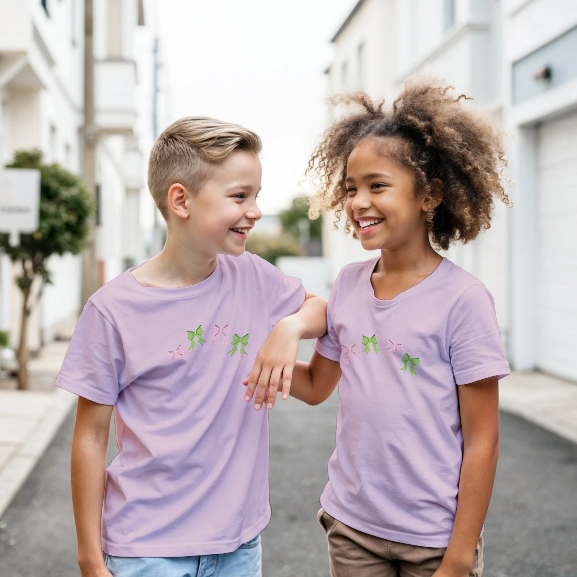 Kids pink t-shirt with pink and green bows design on front