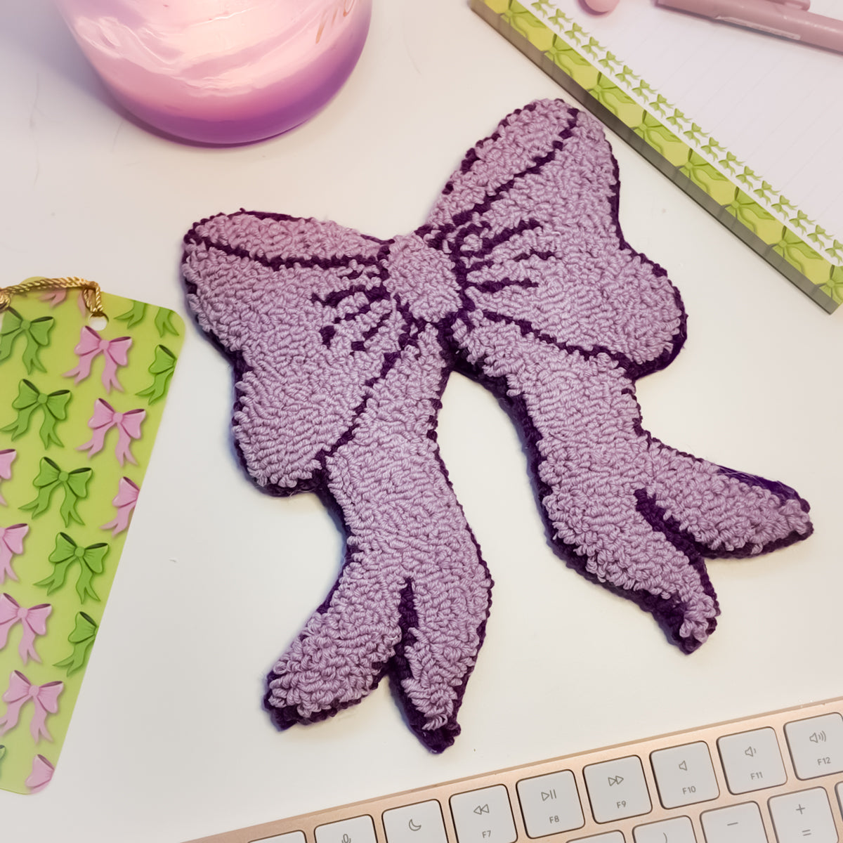 Handmade punch needle lilac mug rug flat lay