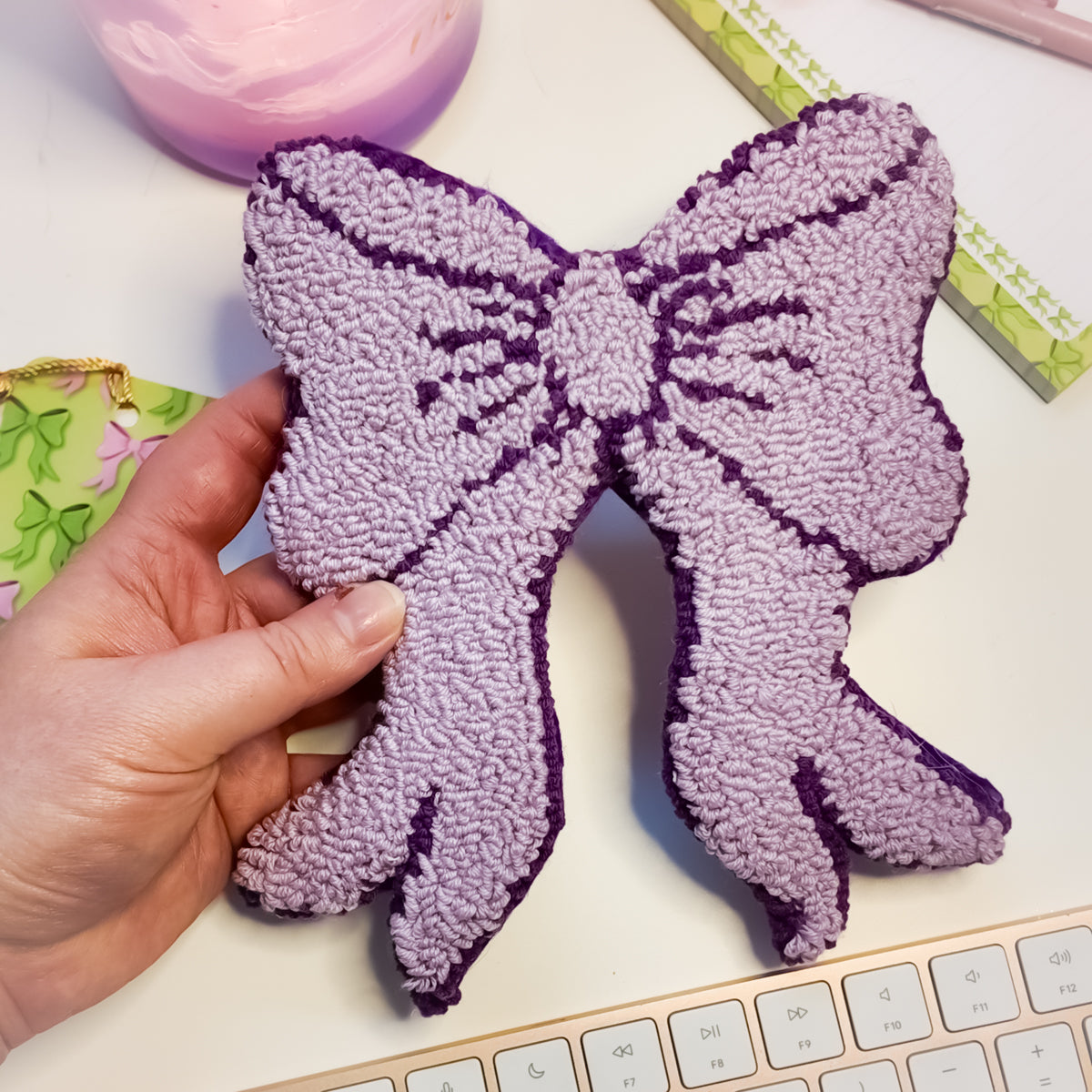 Close up of handmade lilac bow mug rug texture