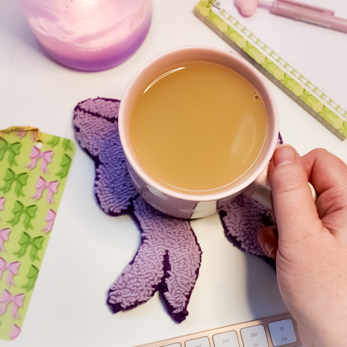 Lilac bow mug rug with stationery and planner setup