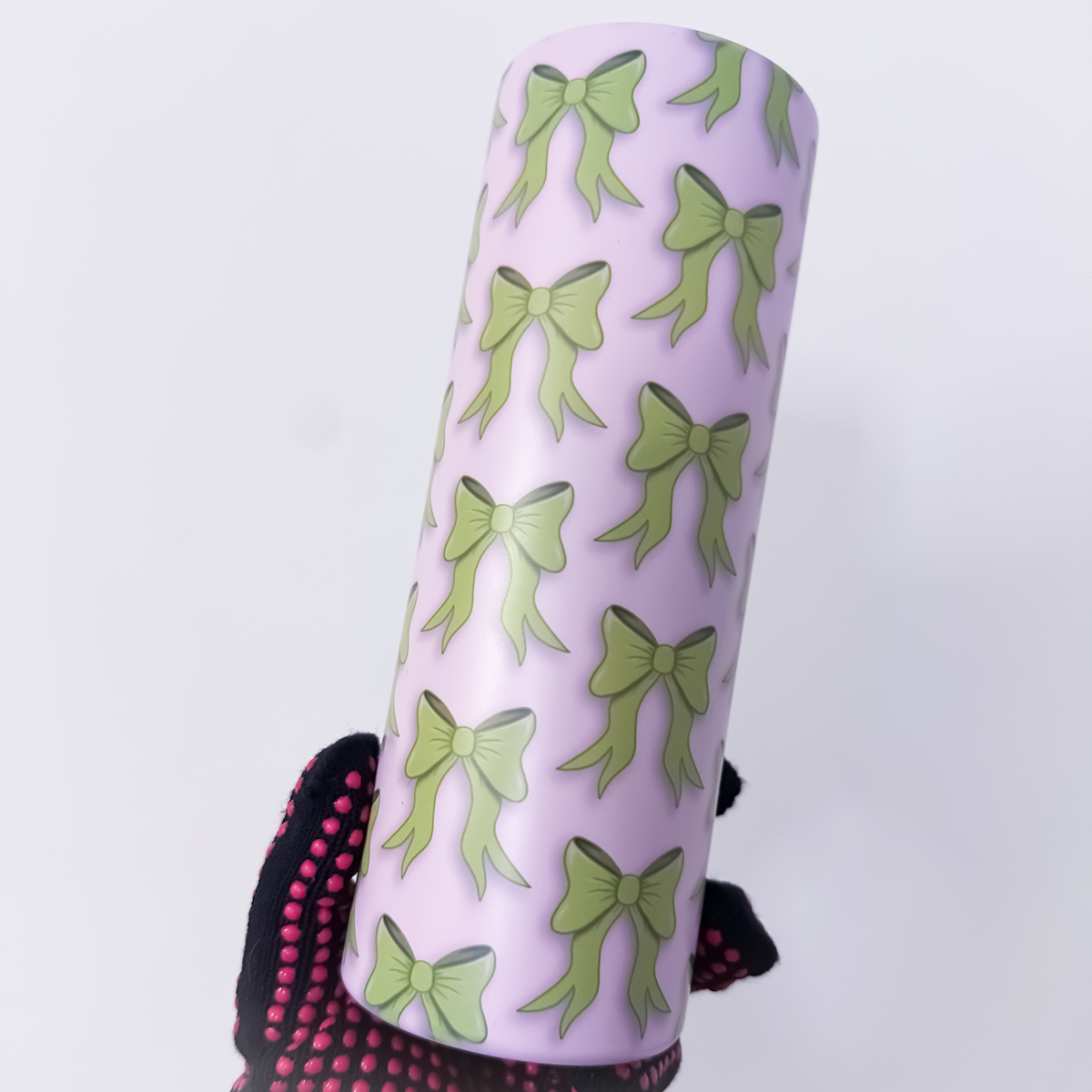 Green tumbler with pink bow pattern, stainless steel insulated cup