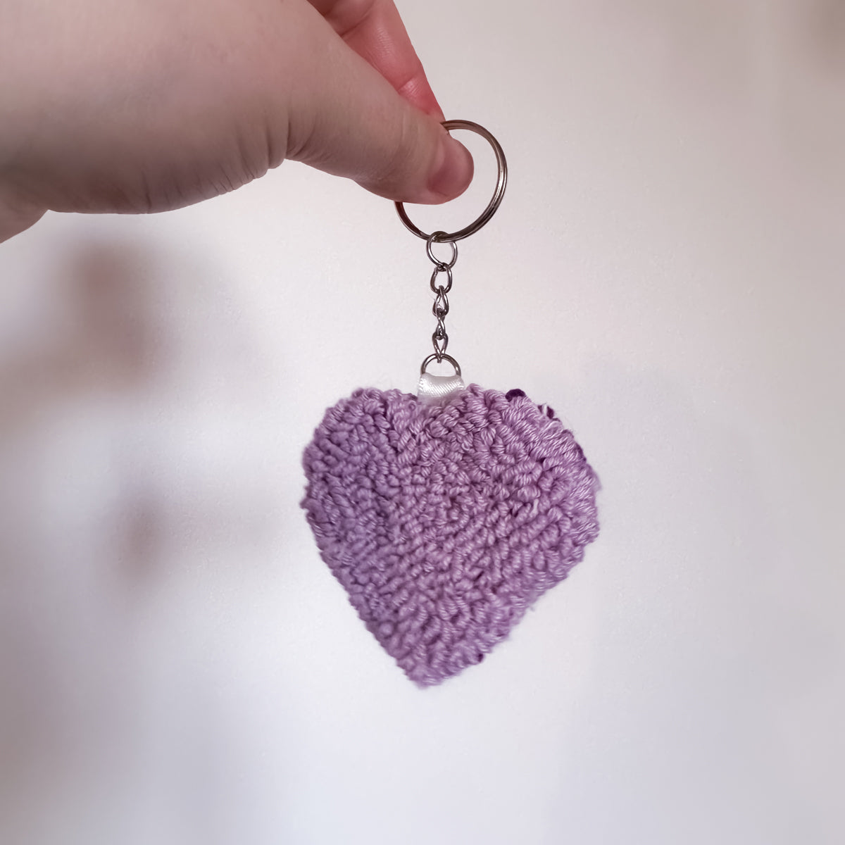 Heart shaped keyring with soft yarn texture