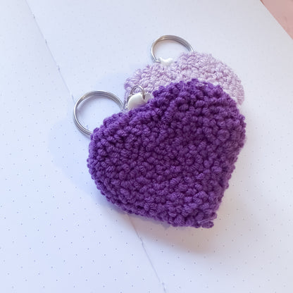 Purple heart-shaped keychain on a white background
