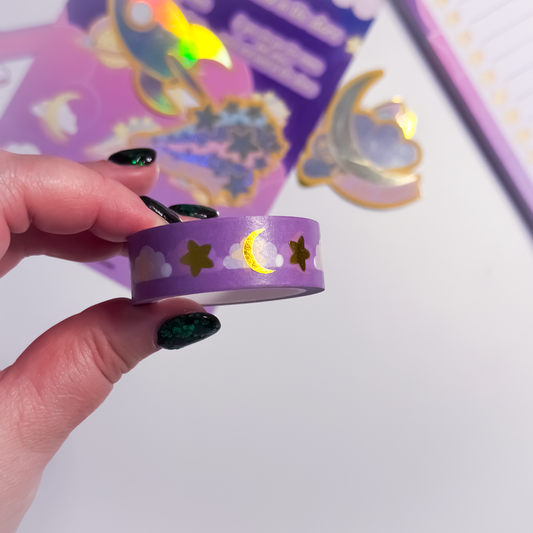 Close-up of gold foil moon and stars on celestial washi tape