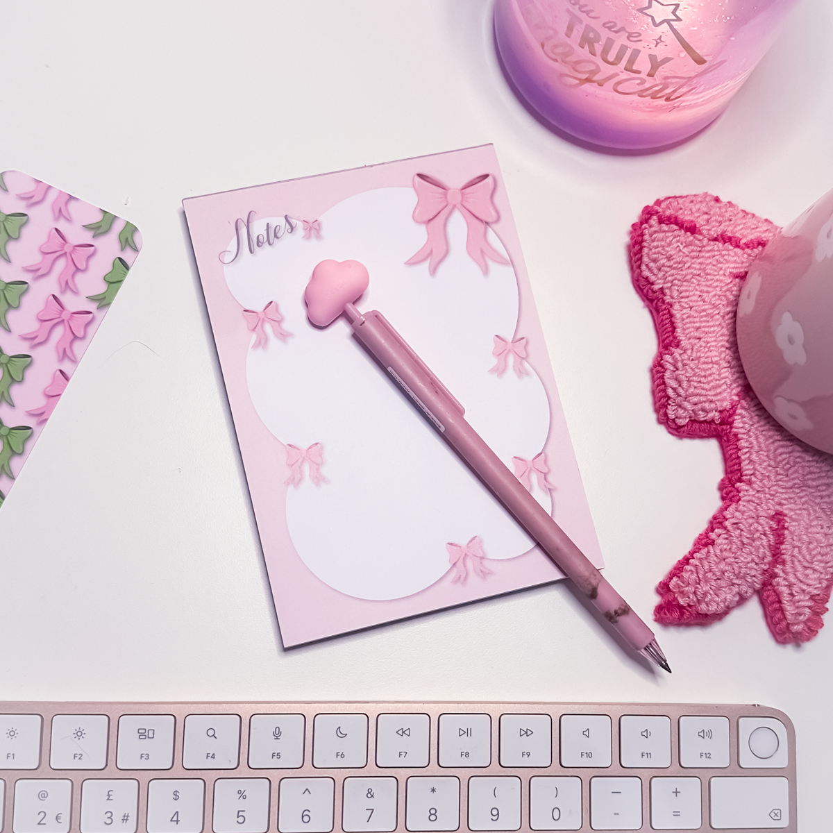Pink bows notes A6 notepad with whimsical pink bow and bubble-style circle design