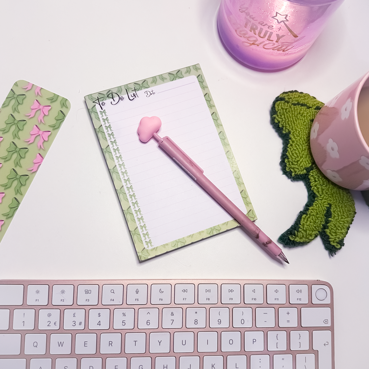 Green bows to-do list A6 notepad with whimsical bow illustrations and tick-off design