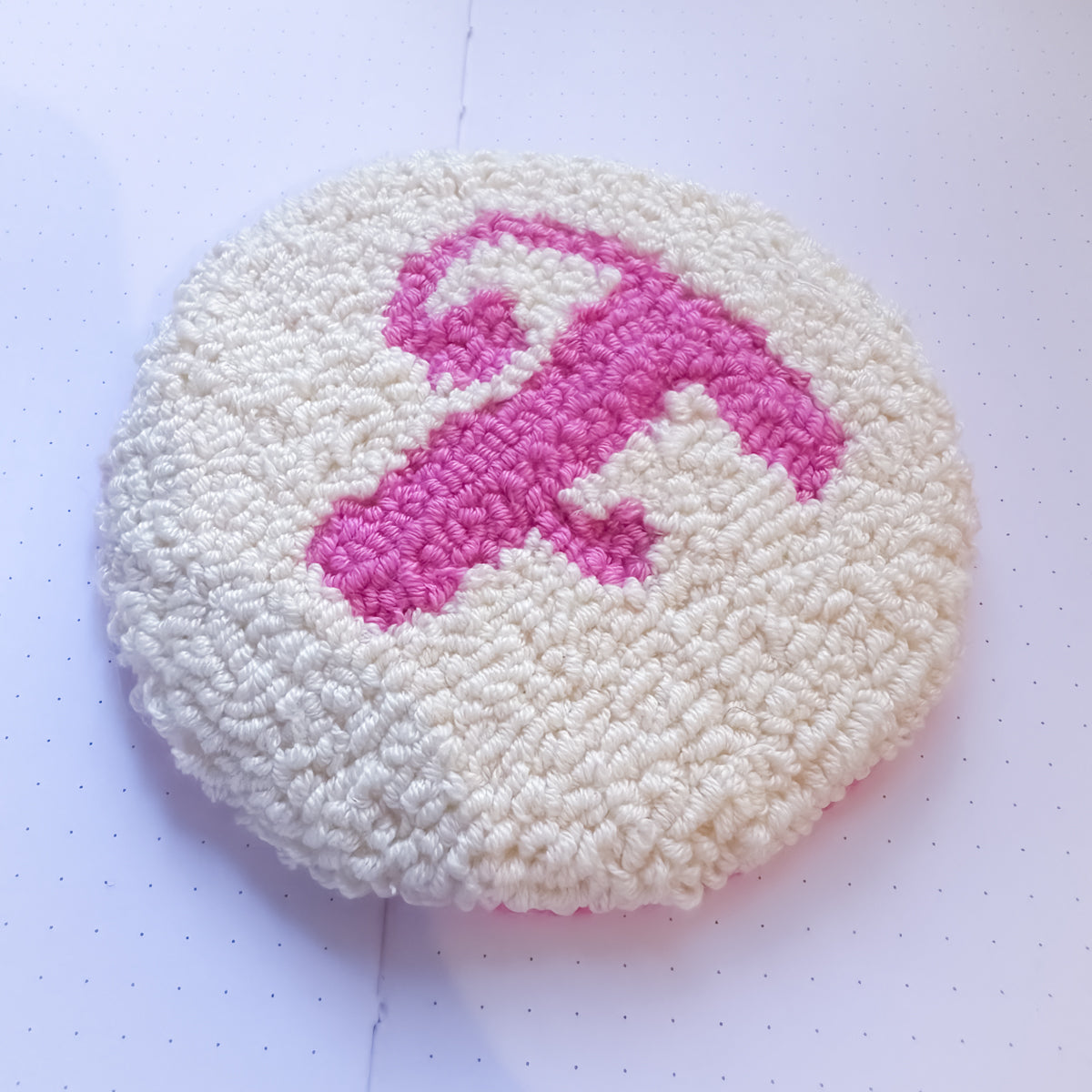 Handmade punch needle mug rug with pink letter