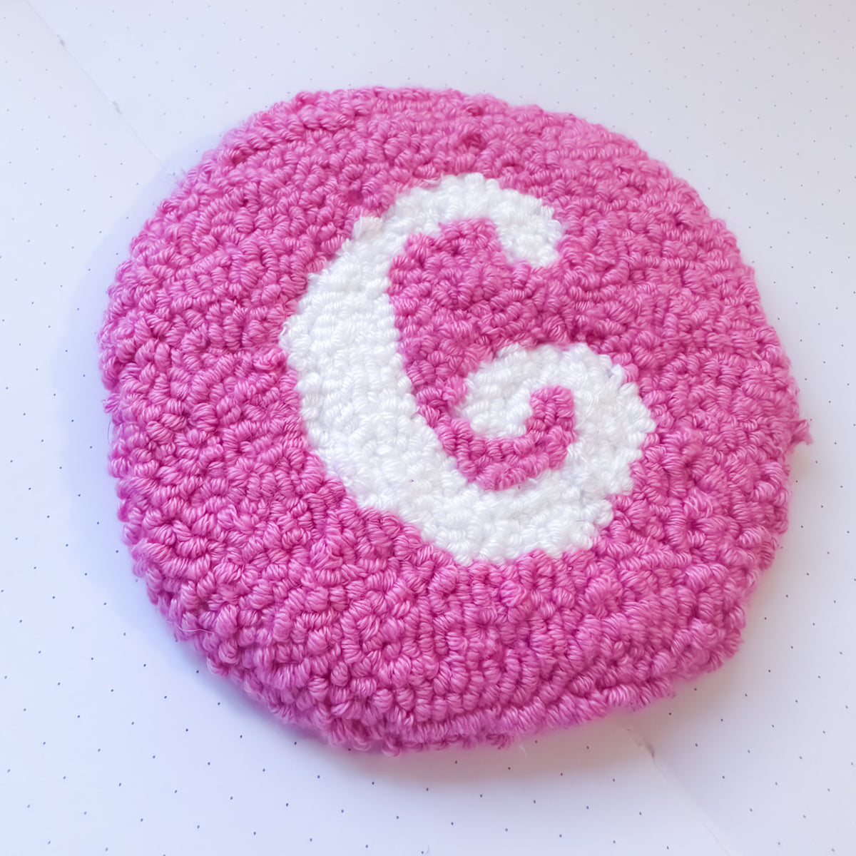 Handmade punch needle mug rug with white initial