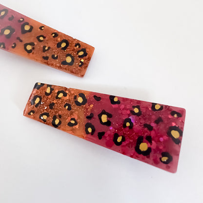END OF LINE - Red and Orange Leopard Print Resin Hair Clips
