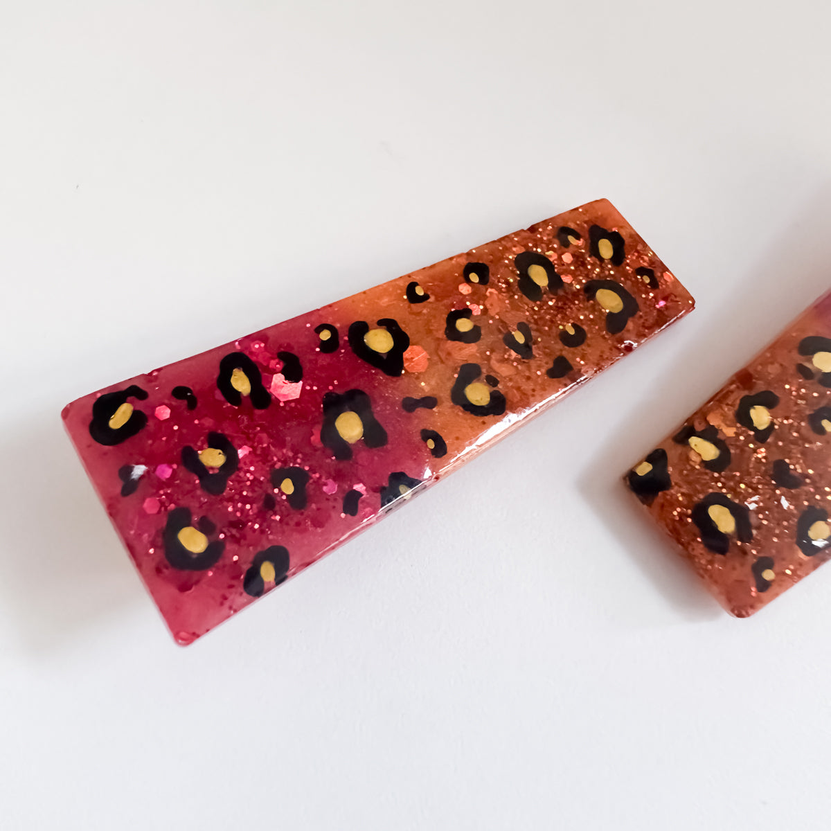 END OF LINE - Red and Orange Leopard Print Resin Hair Clips