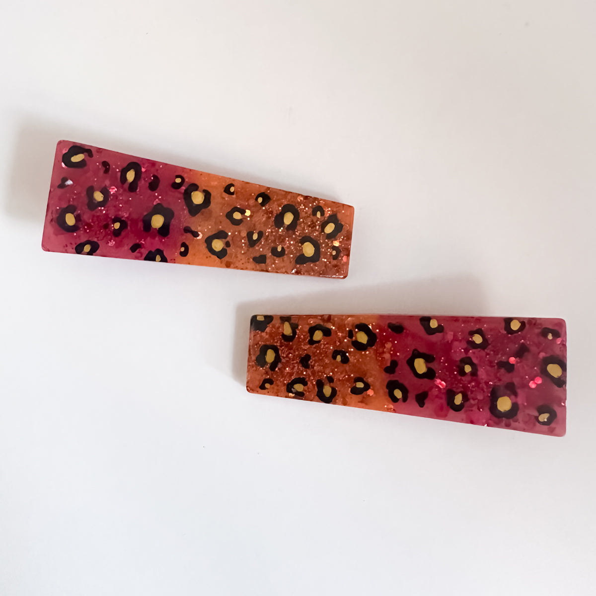END OF LINE - Red and Orange Leopard Print Resin Hair Clips