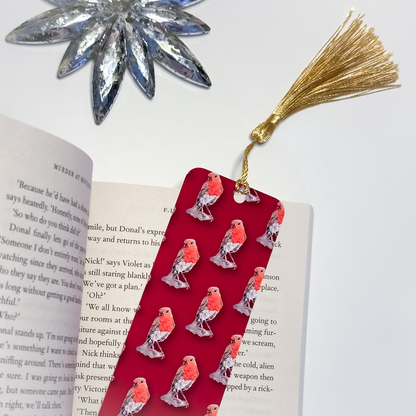 Bookmark with gold tassel option shown flat lay with book