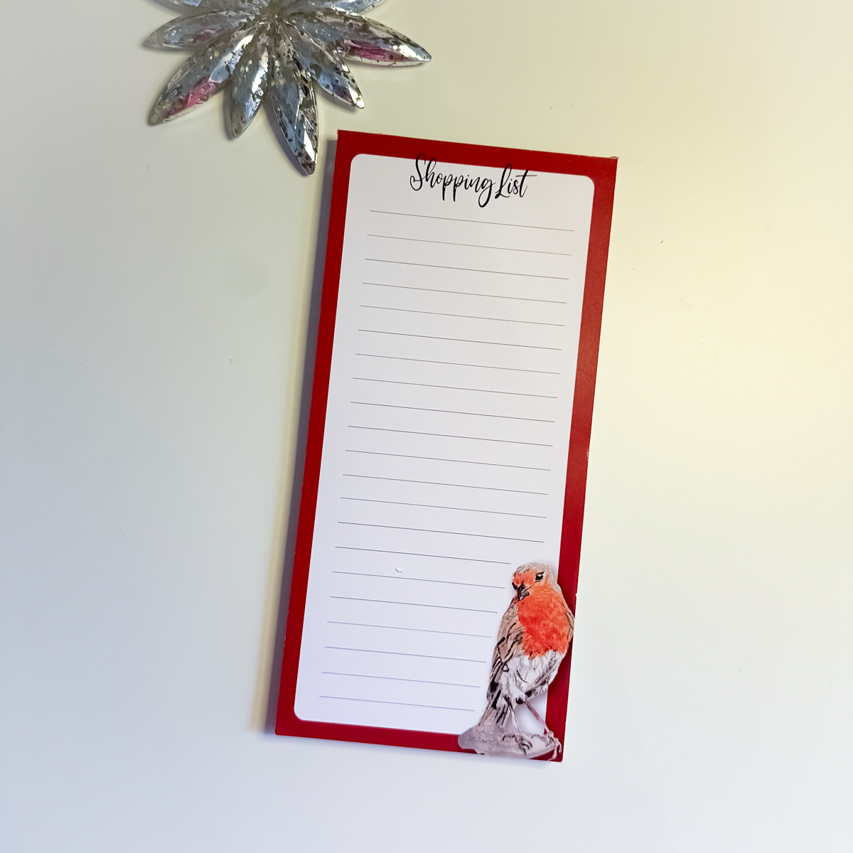 DL notepad pages showing tear-off sheets and gentle red border