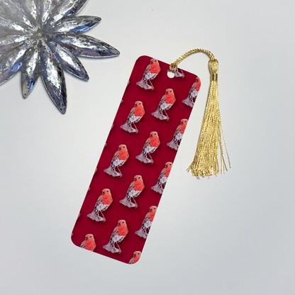 Red bookmark with bird pattern and gold tassel